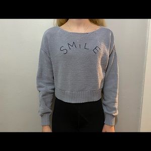 Lauren Conrad, grey, slight crop top.